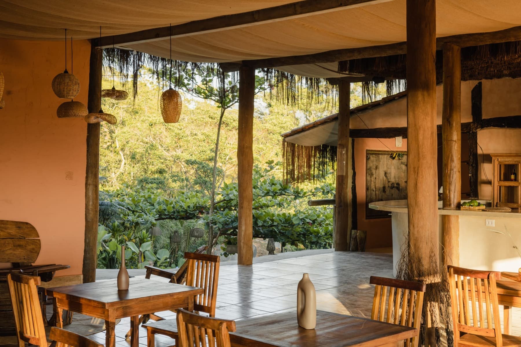 Restaurant hall open to the forest